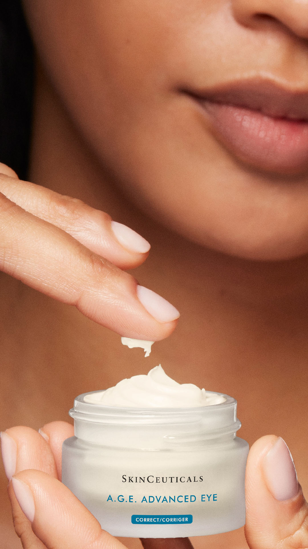 Client applying medical-grade eye cream